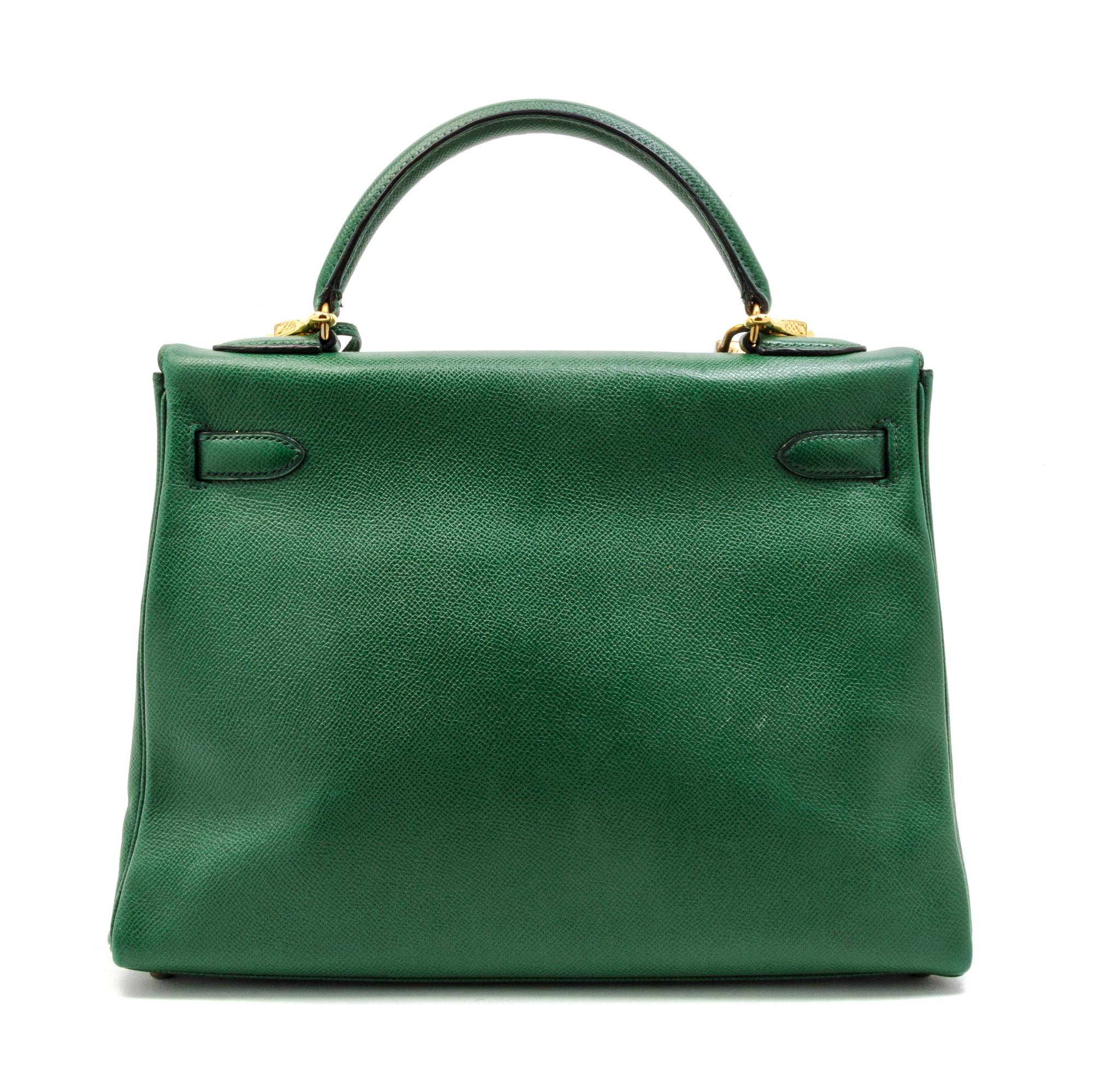 An Hermes 32cm Green Leather Kelly Bag, 12 1/2 x 9 x 4 1/2 inches.