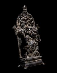 An Indian Bronze Ganesha, Enthroned