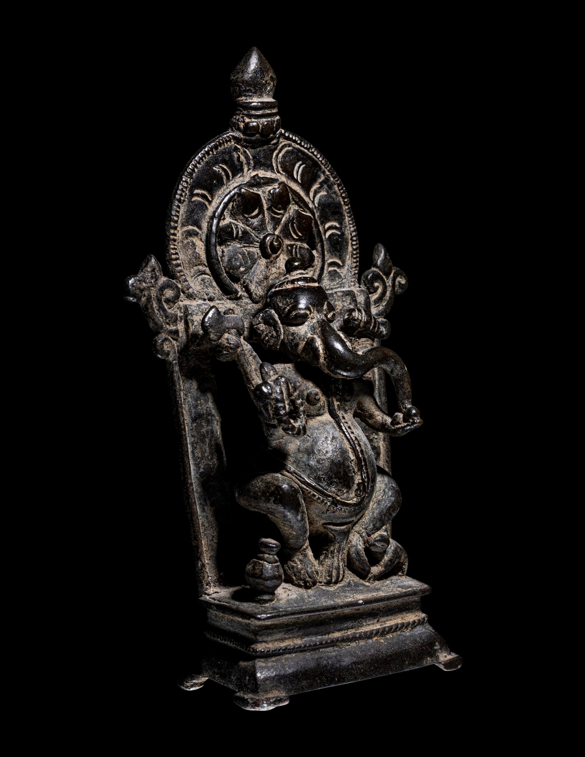 An Indian Bronze Ganesha, Enthroned
