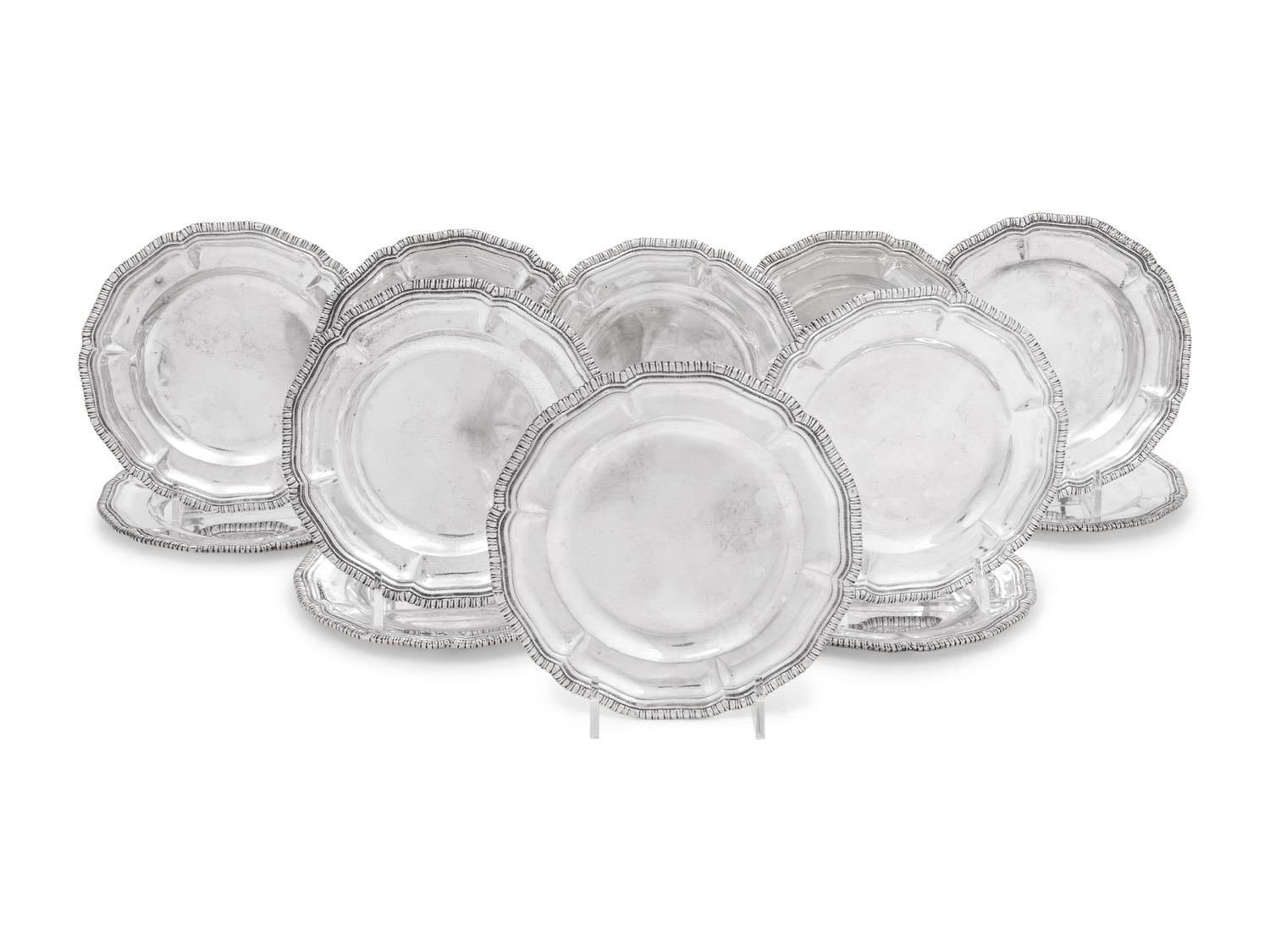 A Set of Twelve Mexican Silver Bread Plates
