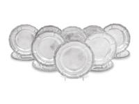 A Set of Twelve Mexican Silver Bread Plates