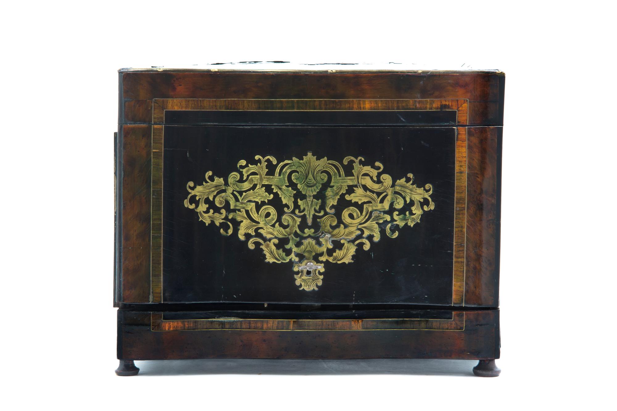 A Napoleon III Brass Inlaid Calamander Cave a Liqueur, Width 12 5/8 inches.