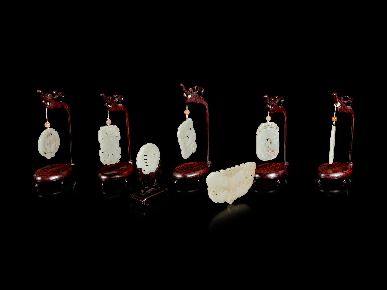 Seven Chinese Pale Celadon Jade Pendants