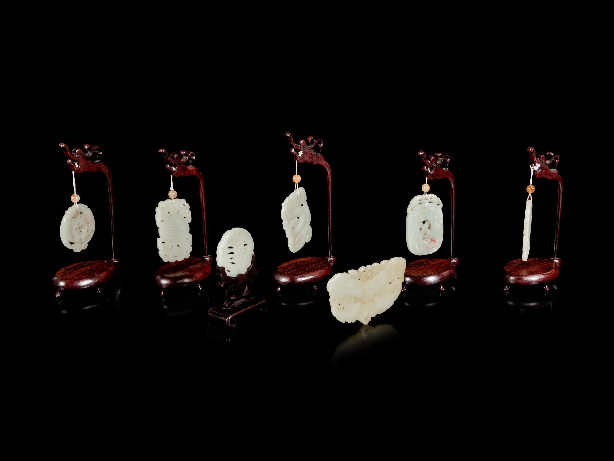 Seven Chinese Pale Celadon Jade Pendants
