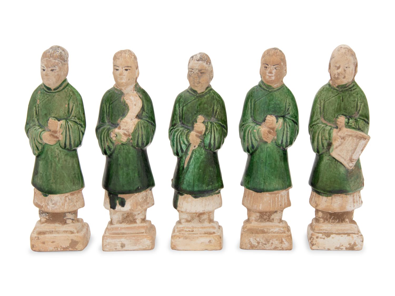 A Set of Five Chinese Green Glazed Porcelain Figures