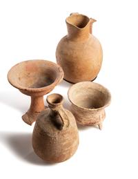 A Group of 19 Holy Land Terracotta Oil Lamps, Pottery, and Bronze Blades