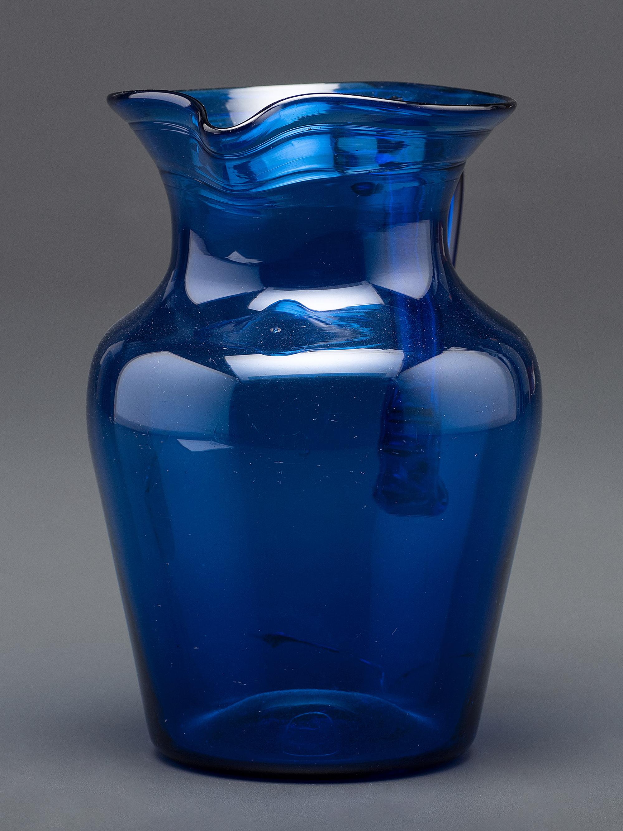A Midwestern Glass Pitcher in Blue