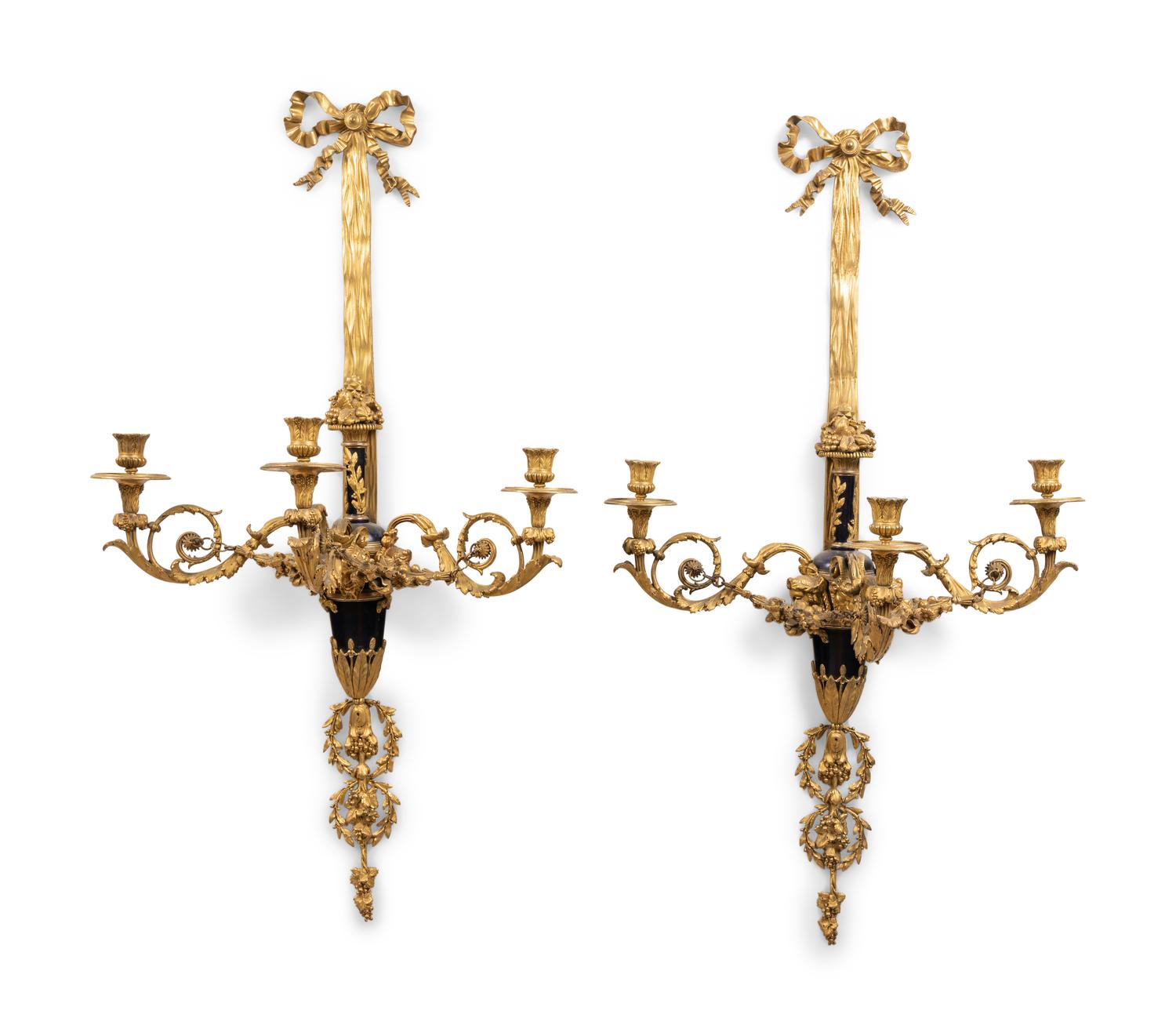 A Pair of Louis XVI Style Gilt Bronze Three-Light Wall Sconces