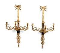 A Pair of Louis XVI Style Gilt Bronze Three-Light Wall Sconces