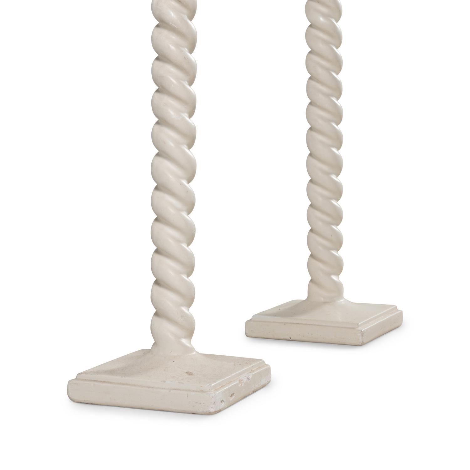 A Pair of White Composition Floor Lamps
