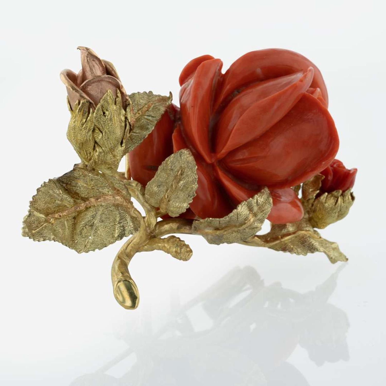 A Two-Tone Yellow and Rose Gold Carved Coral Pendant