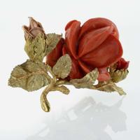 A Two-Tone Yellow and Rose Gold Carved Coral Pendant
