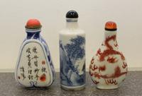 Three Porcelain Snuff Bottles Height of tallest 3 1/4 inches.