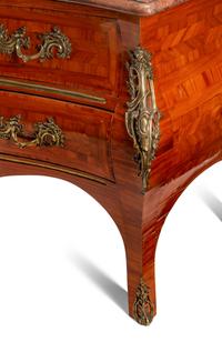 A Régence Style Gilt Bronze Mounted Parquetry Marble-Top Commode