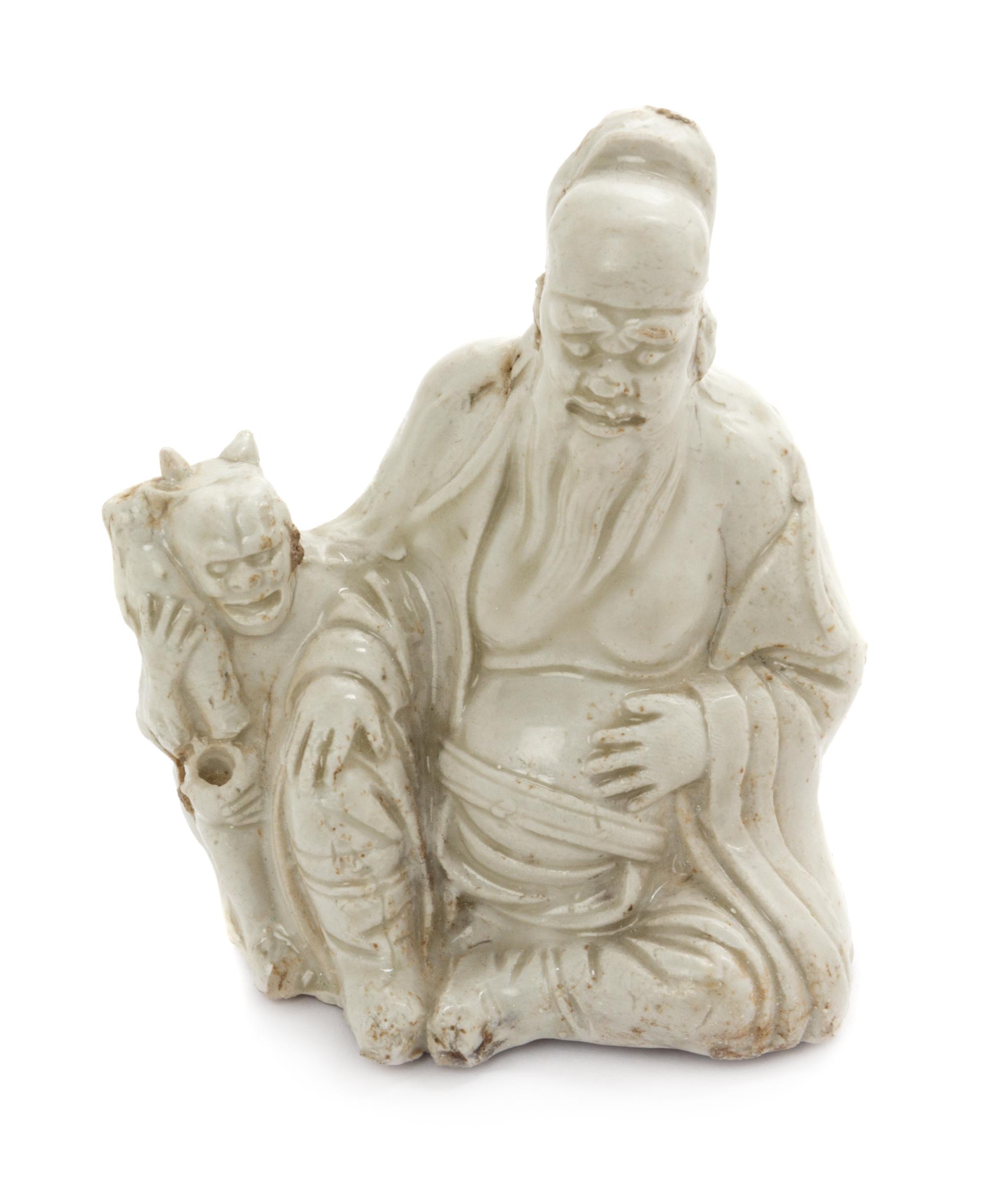 A White Glazed Porcelain Figural Form Vessel Height 4 1/2 inches. — LIAO DYNASTY (916-1125)