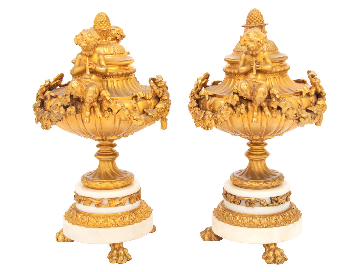 A Pair of Louis XVI Style Gilt Bronze and Marble Covered Urns