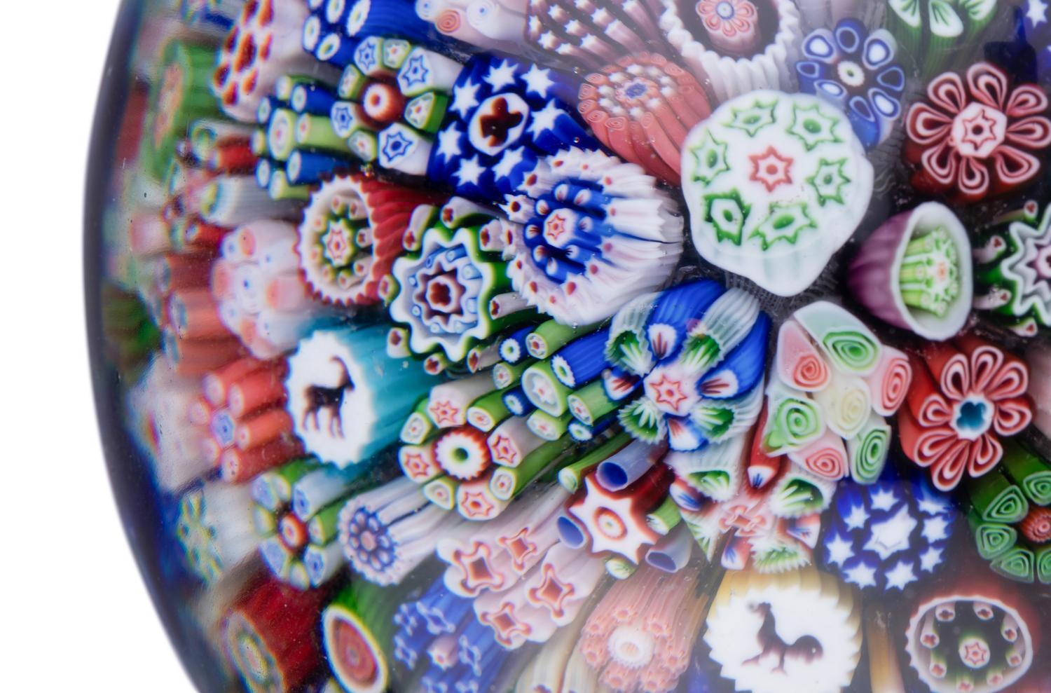 A Baccarat Close Packed Millefiori and Silhouette Glass Paperweight