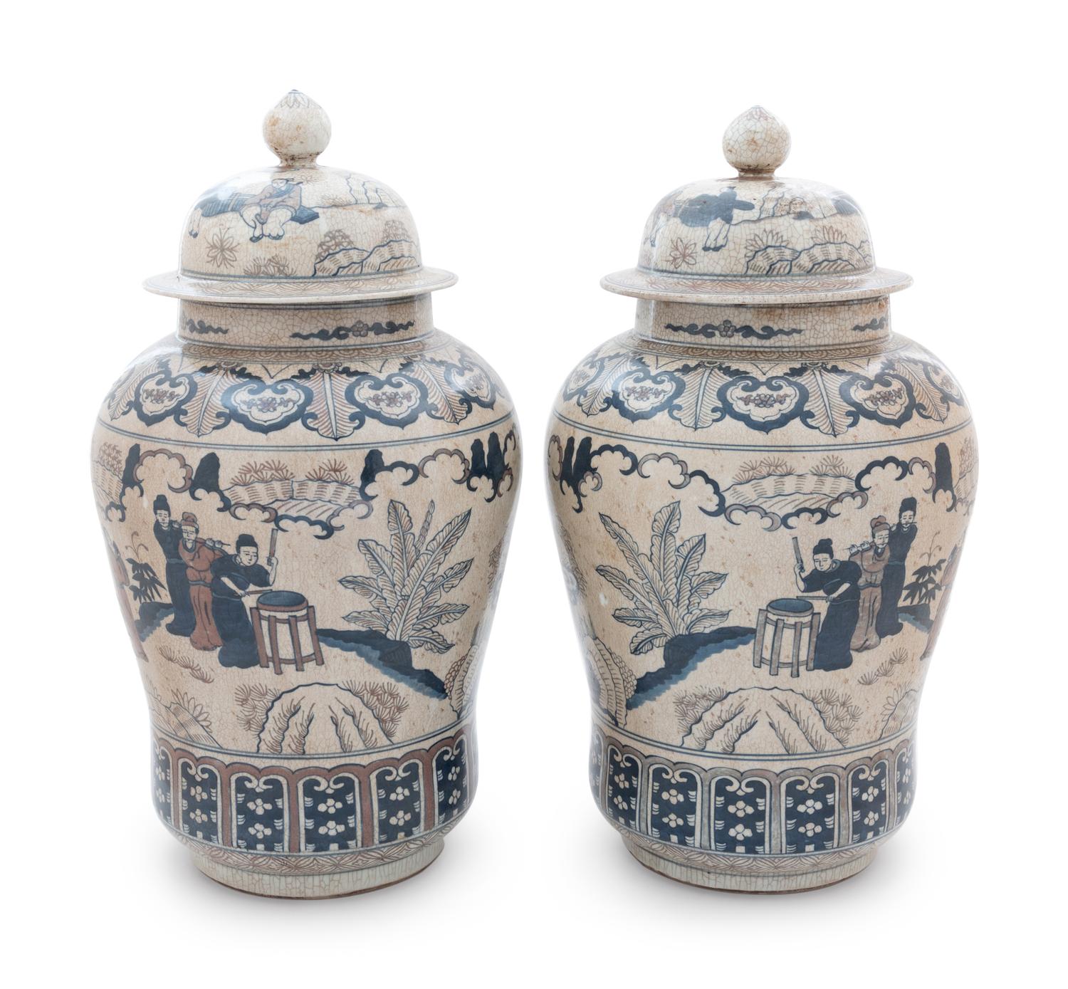 A Pair of Chinese Crackle Ground Underglaze Blue and Iron-Red Covered Vase