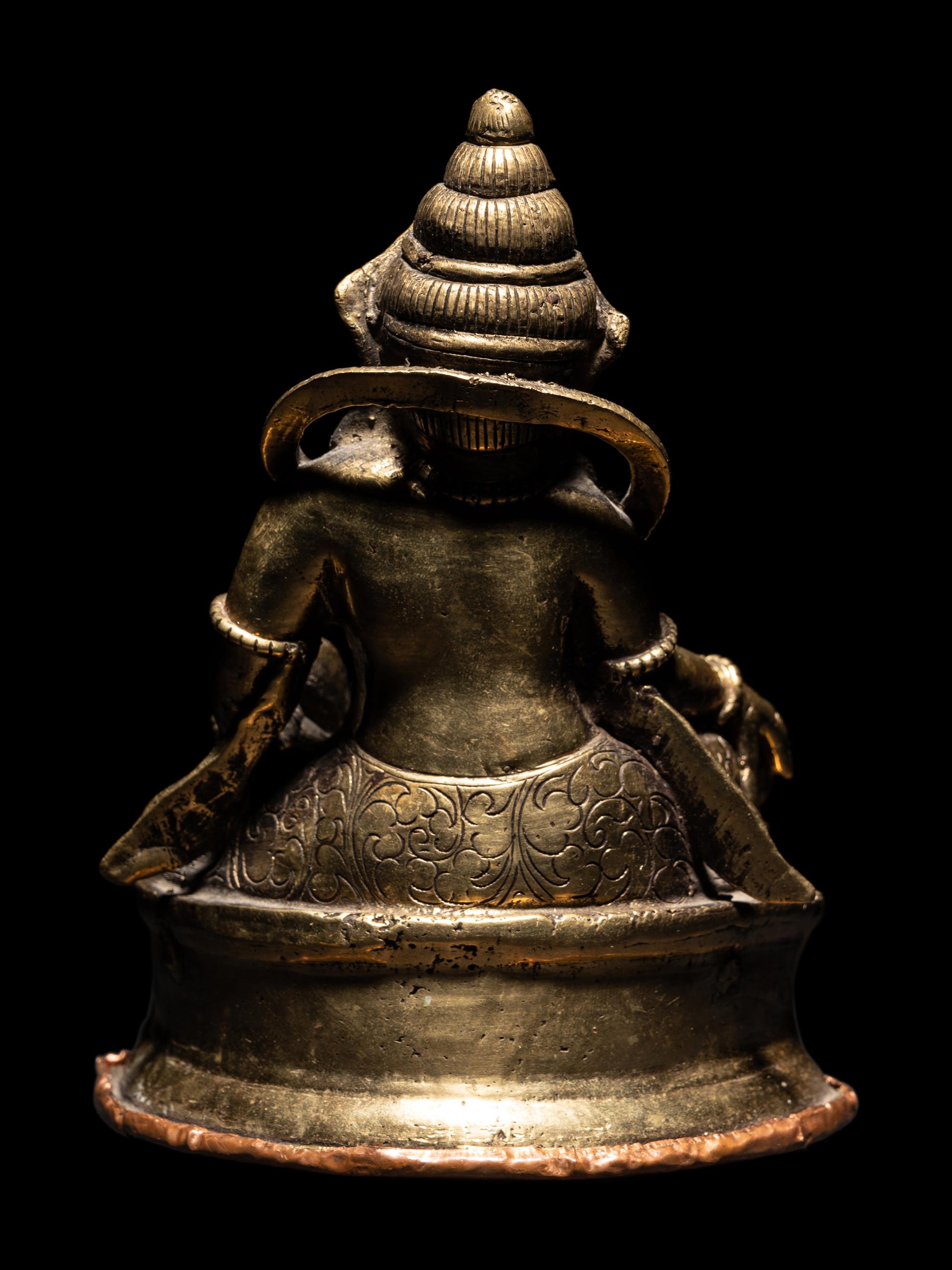 A Sino-Tibetan Bronze Figure of Jambhala