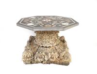 A Pietra Dura and Scagliola Hexagonal Tabletop on an Indian Corinthian Capital-Form Base — 20TH CENTURY