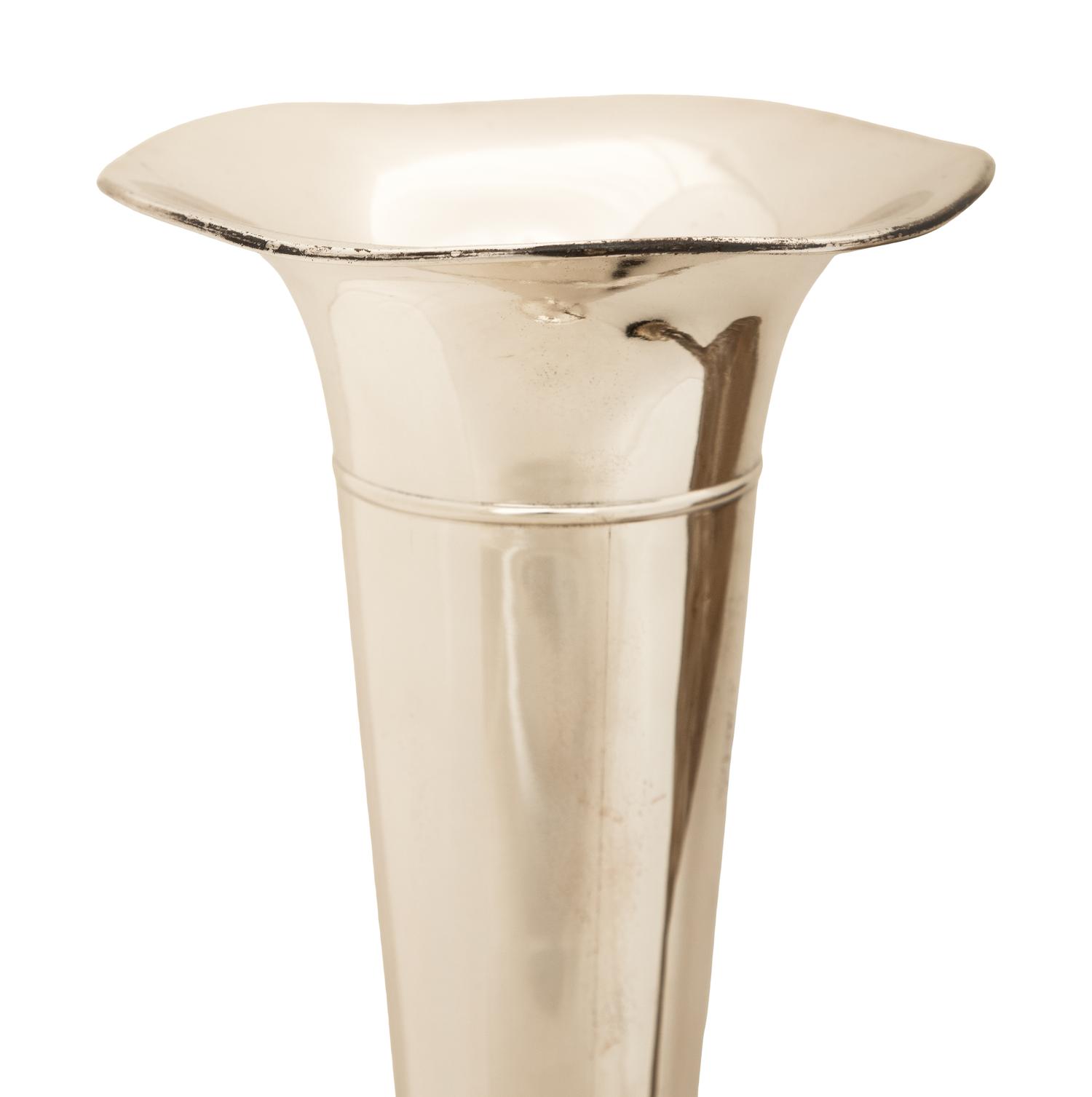 An American Silver Trumpet Vase and A Silvered-Metal Figure of a Winged Dancer