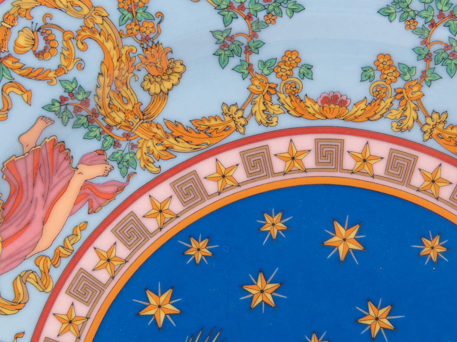 Eight Versace Porcelain Christmas Chargers