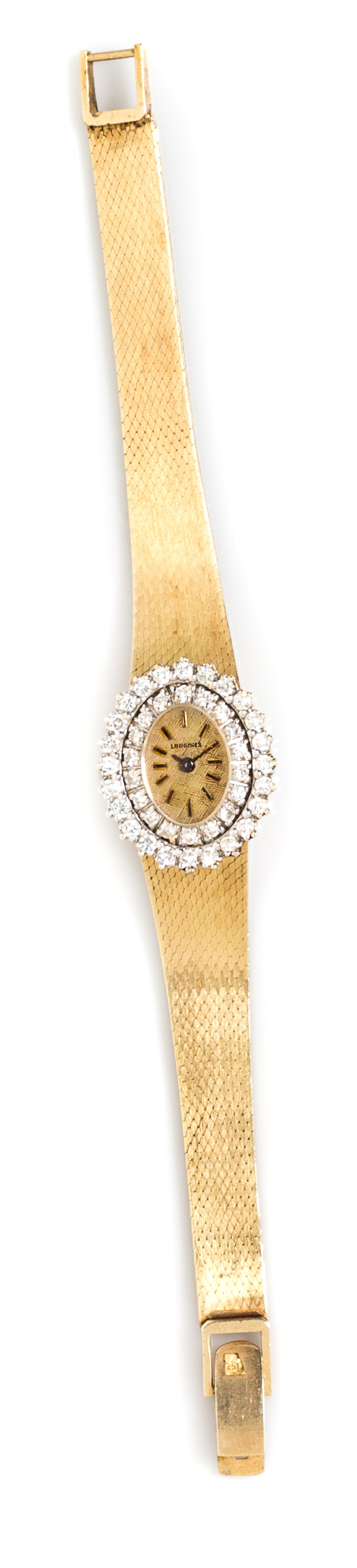 A 14 Karat Yellow Gold and Diamond Wristwatch, Longines, 18.90 dwts.
