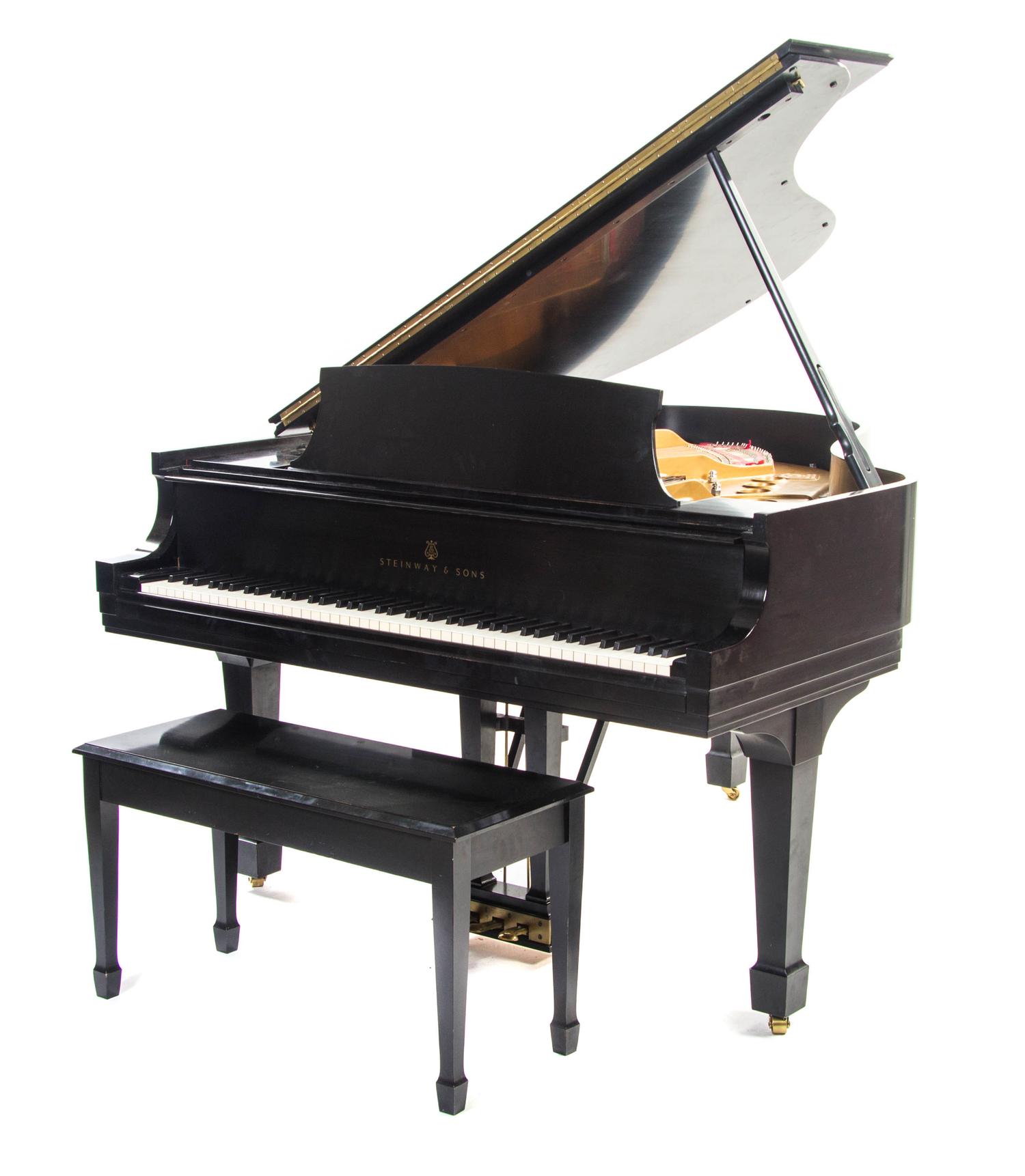 A Steinway & Sons Baby Grand Piano, 1975, MODEL M, Length 67 inches. — 1975, MODEL M,
