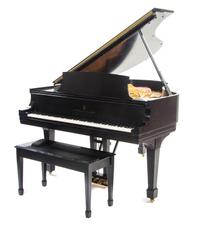 A Steinway & Sons Baby Grand Piano, 1975, MODEL M, Length 67 inches. — 1975, MODEL M,