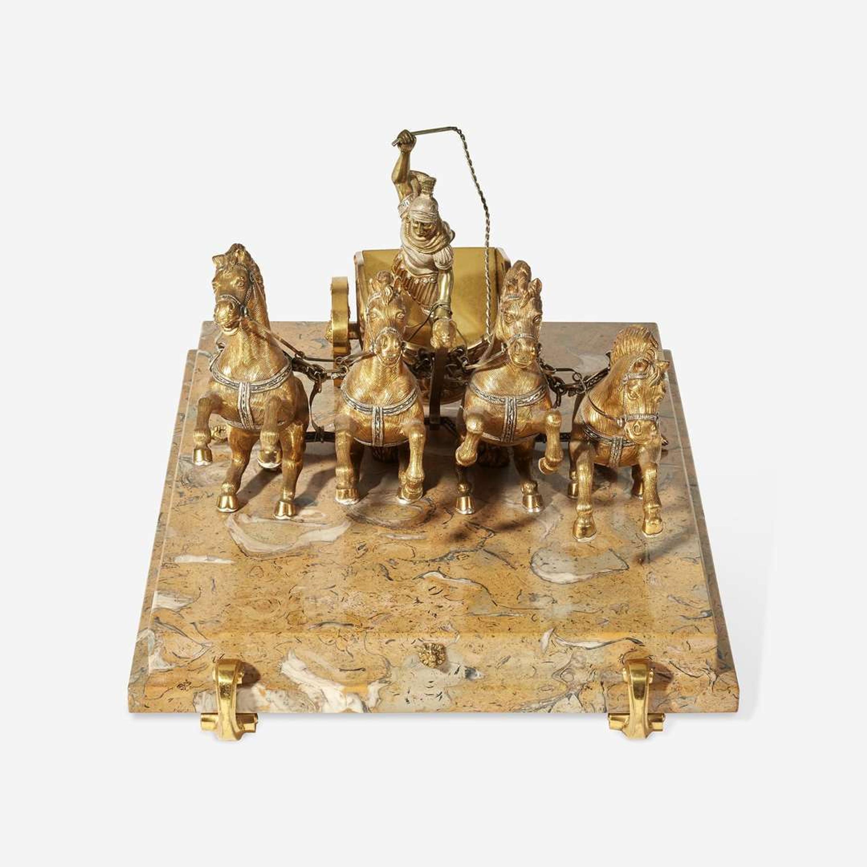 A Continental Gilt and Silvered Metal Model of a Roman Quadriga Led by a Charioteer
