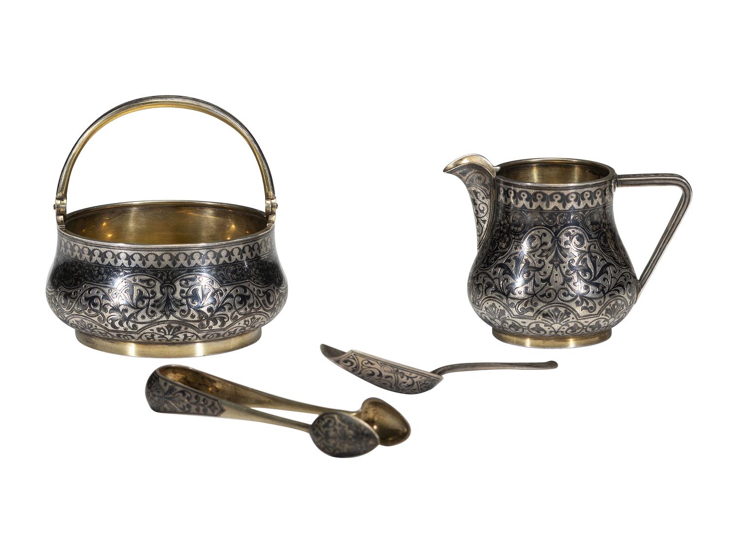 A Russian Niello Inlaid Silver Four-Piece Serving Set