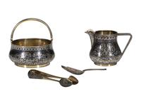 A Russian Niello Inlaid Silver Four-Piece Serving Set