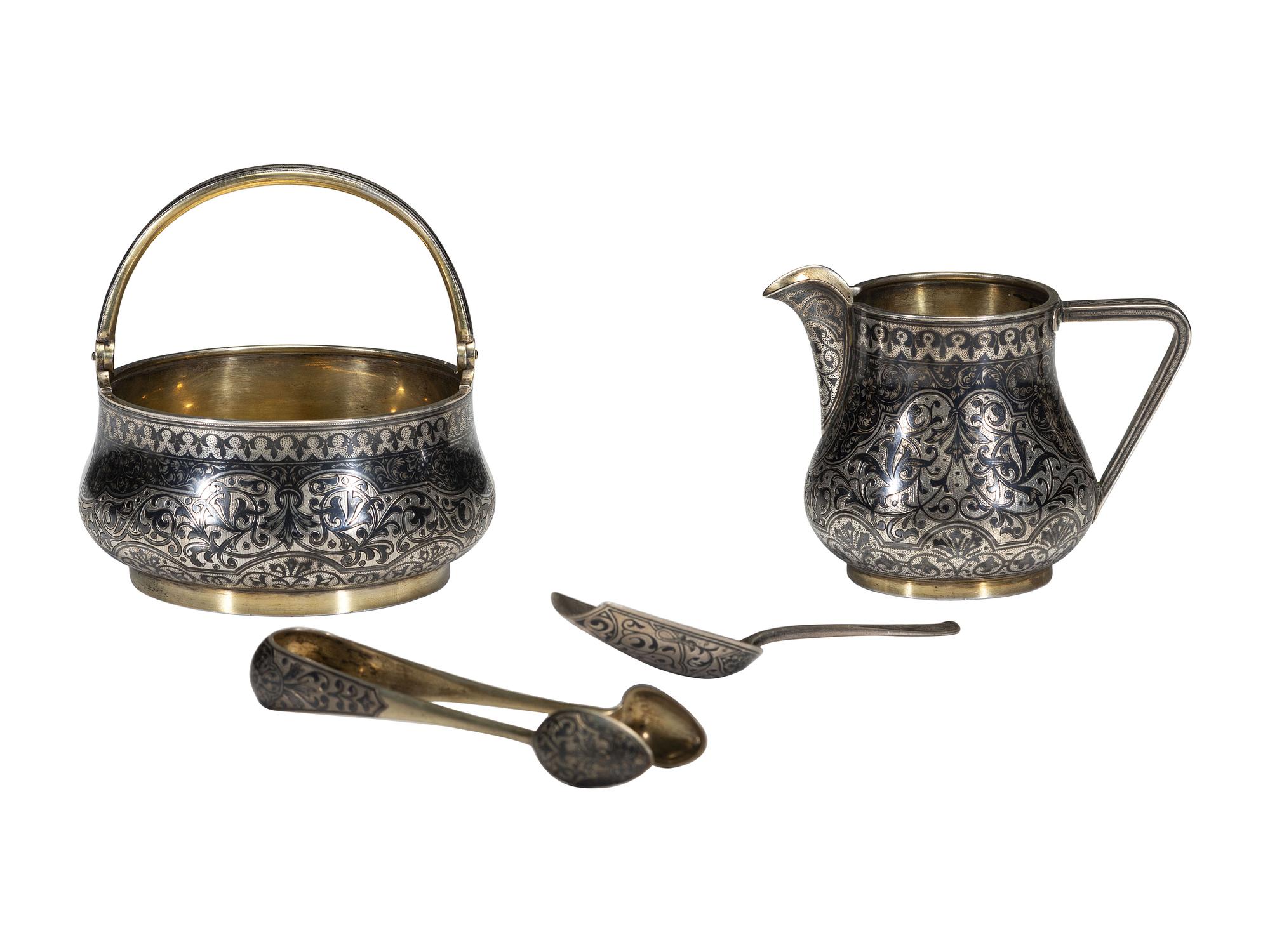 A Russian Niello Inlaid Silver Four-Piece Serving Set
