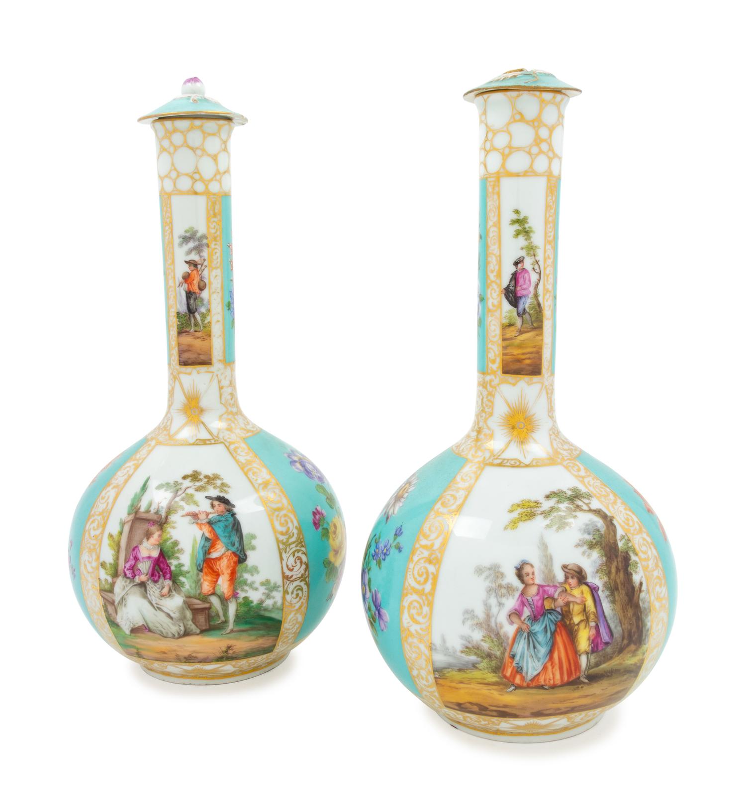A Pair of German Porcelain Covered Vases