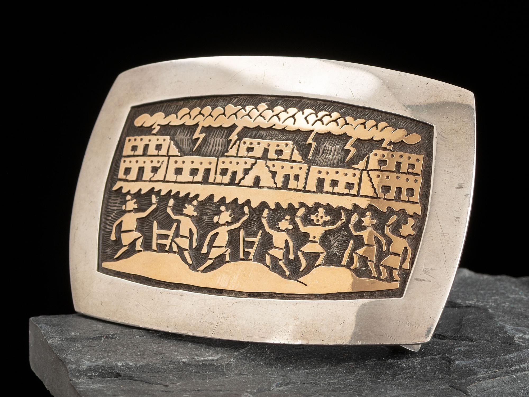 Sterling Silver and 14K Gold Belt Buckle, with Storming Pueblo and Mudhead Scene