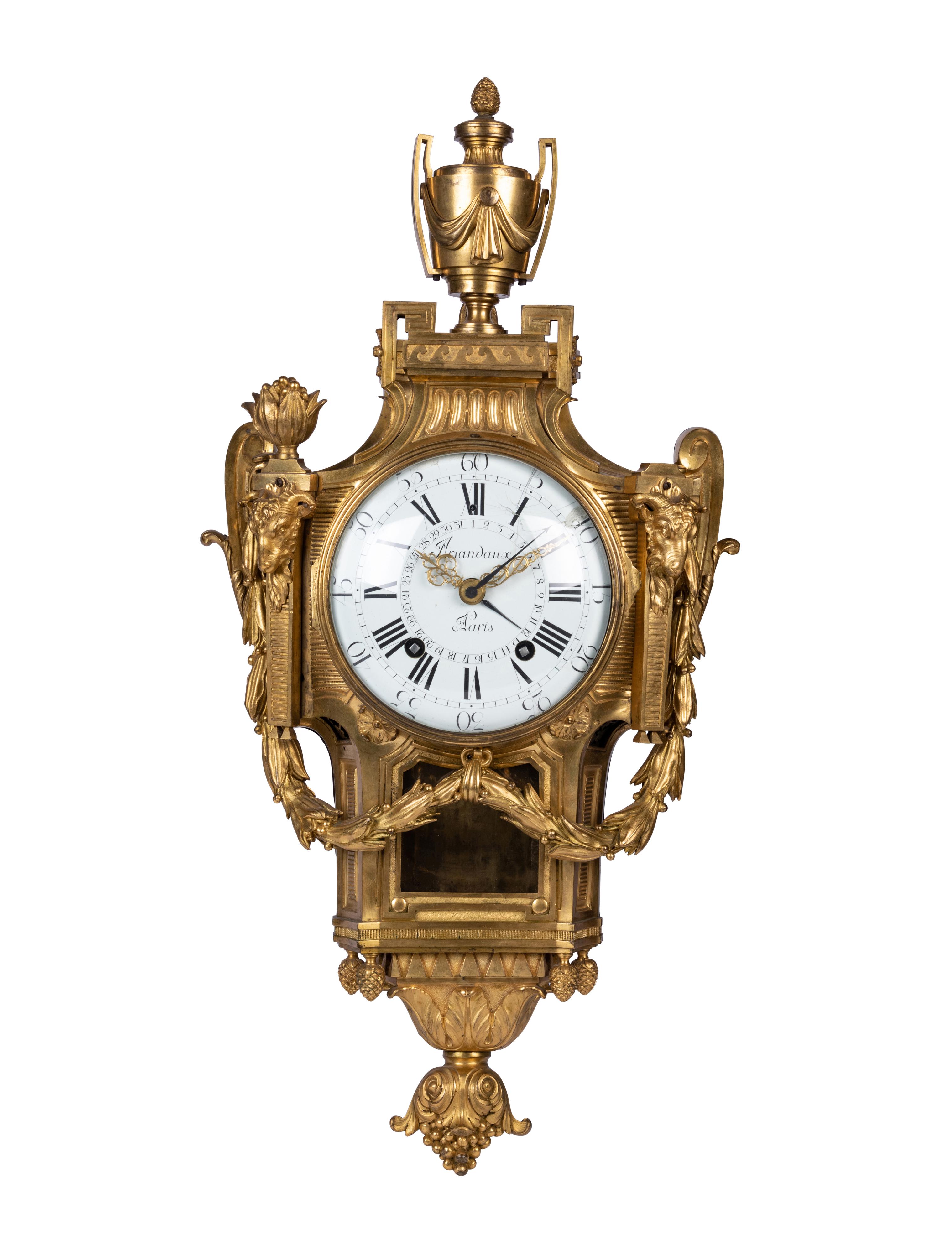 A Louis XVI Gilt Bronze Cartel Clock
