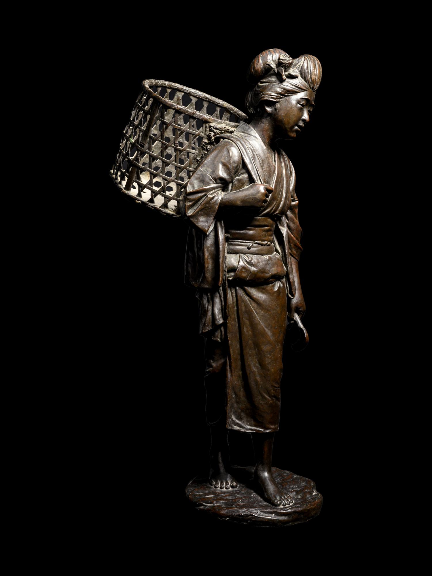 A Bronze Okimono of a Lady