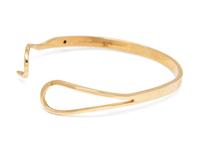 A 14 Karat Yellow Gold and Ruby Bangle Bracelet,
