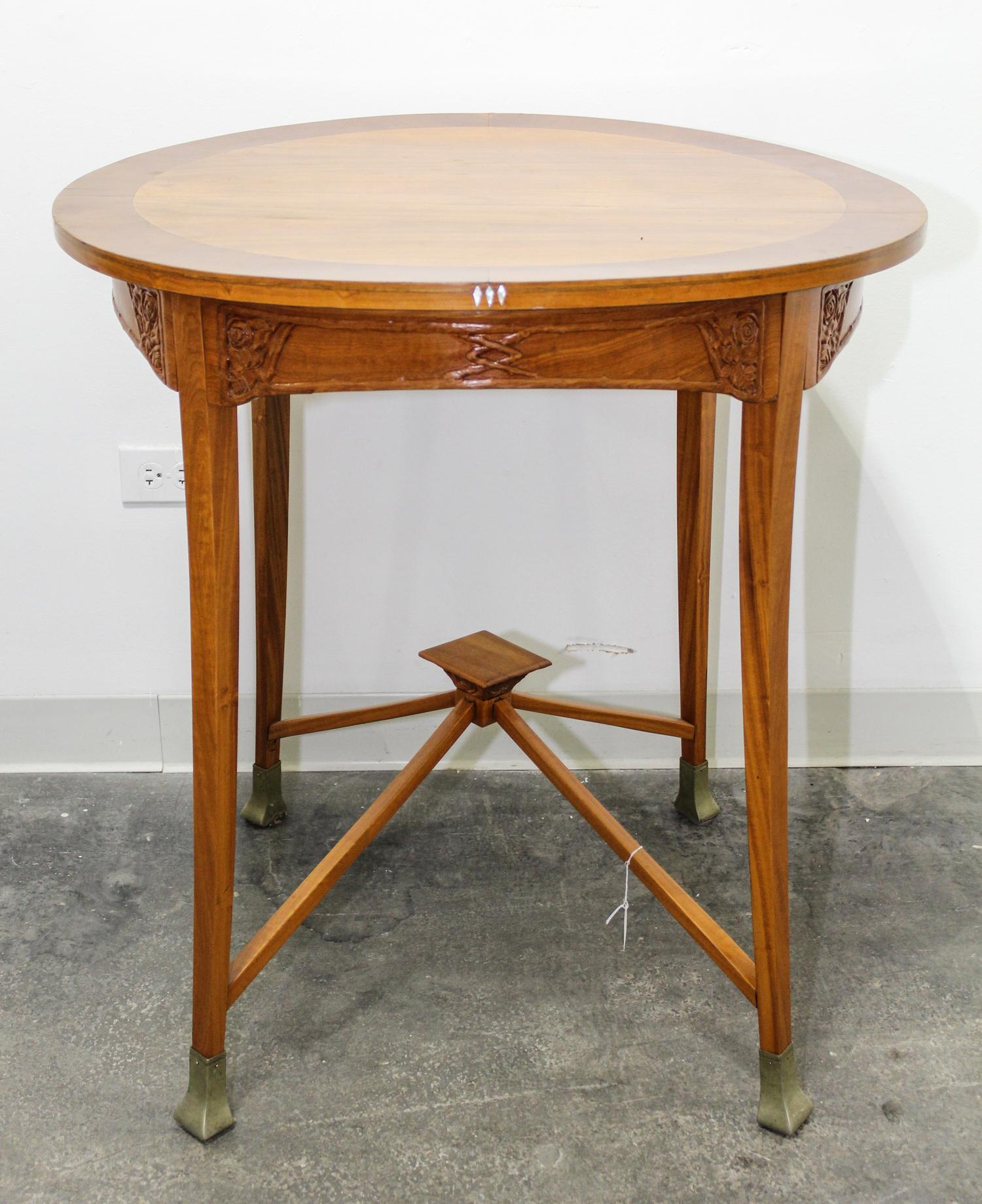 A Vienna Secessionist Occasional Table Height 31 3/4 x diameter 29 1/2 inches. — c. 1900
