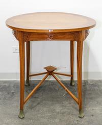 A Vienna Secessionist Occasional Table Height 31 3/4 x diameter 29 1/2 inches. — c. 1900