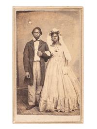 [EARLY PHOTOGRAPHY]. CDV of an African American bride and groom. Quincy, IL: Mrs. W.A. Reed.