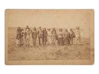 [NATIVE AMERICANS]. Boudoir photograph of Apache subjects, likely at San Carlos Indian Reservation, Arizona.