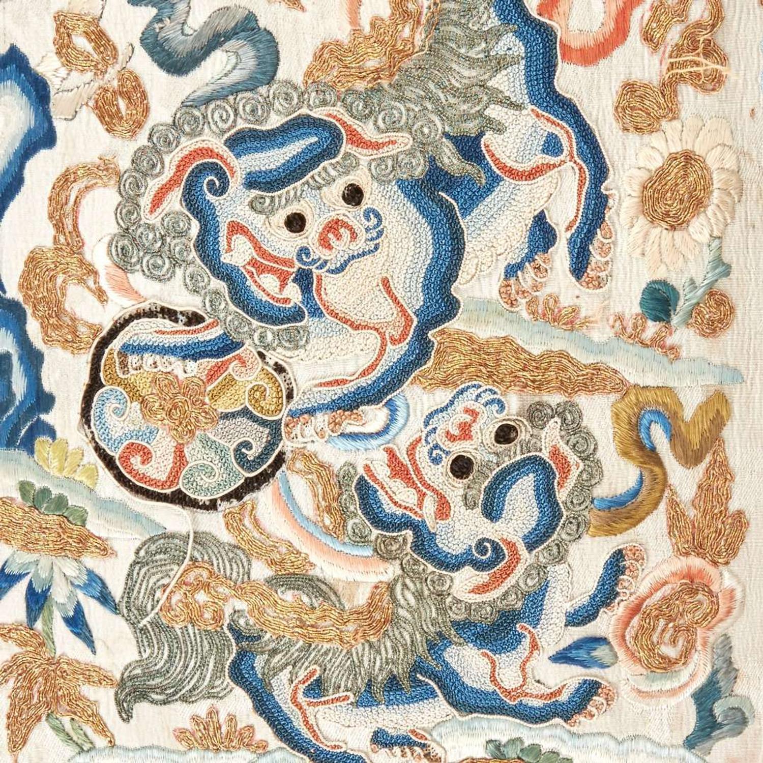 A Chinese embroidered silk "Buddhist Lions" panel, mounted as a pillow 刺绣太狮少狮画片嵌枕头 The panel Qing Dynasty ?????