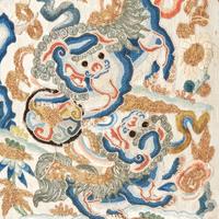 A Chinese embroidered silk "Buddhist Lions" panel, mounted as a pillow 刺绣太狮少狮画片嵌枕头 The panel Qing Dynasty ?????