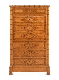 A Victorian Faux Bamboo-Carved Birdseye Maple Bureau Chest