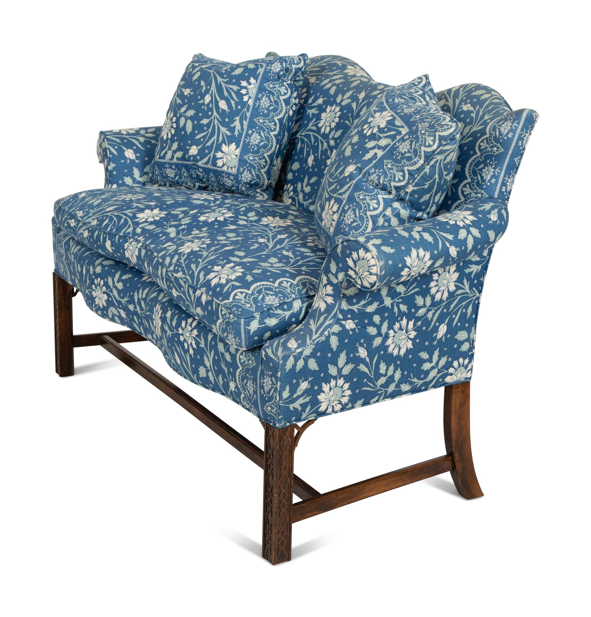 A George III Style Mahogany Settee Upholstered in Blue and White Linen