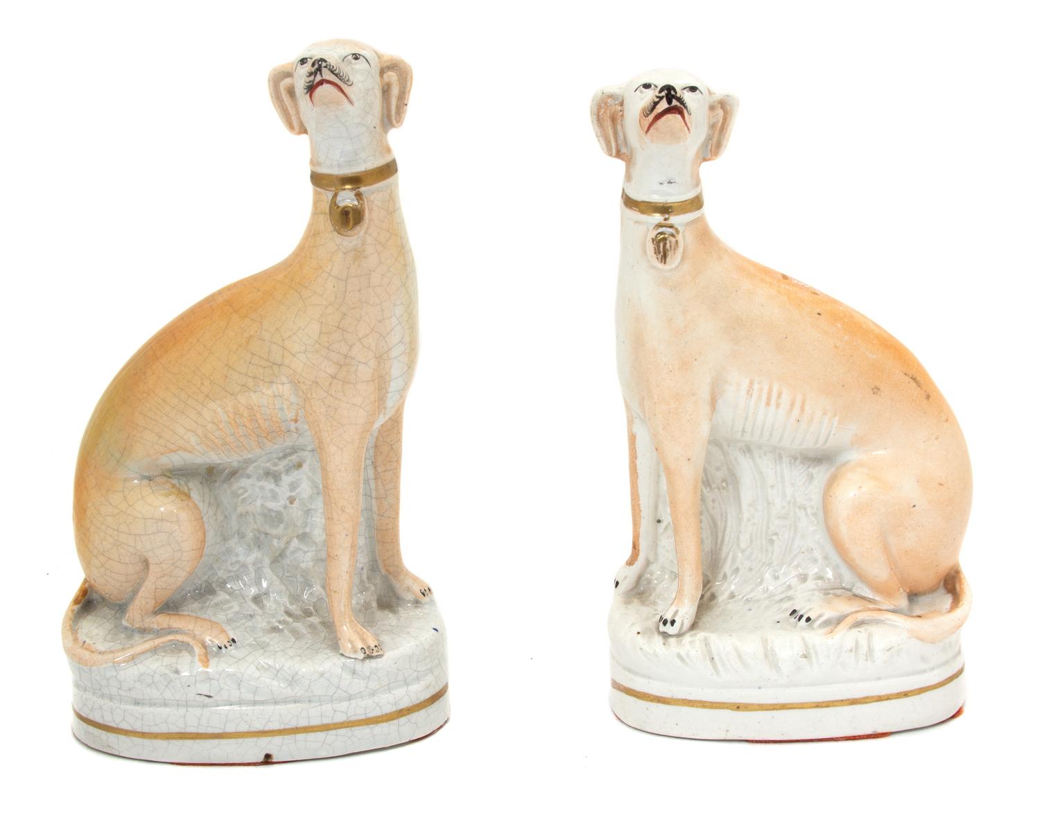 A Pair of Staffordshire Porcelain Models of Greyhounds Height 8 x width 4 1/2 inches. — CIRCA 1810