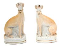 A Pair of Staffordshire Porcelain Models of Greyhounds Height 8 x width 4 1/2 inches. — CIRCA 1810