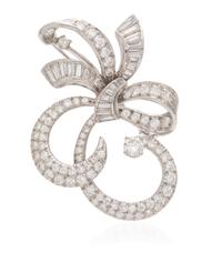 A Platinum and Diamond Bow Brooch, 7.70 dwts.