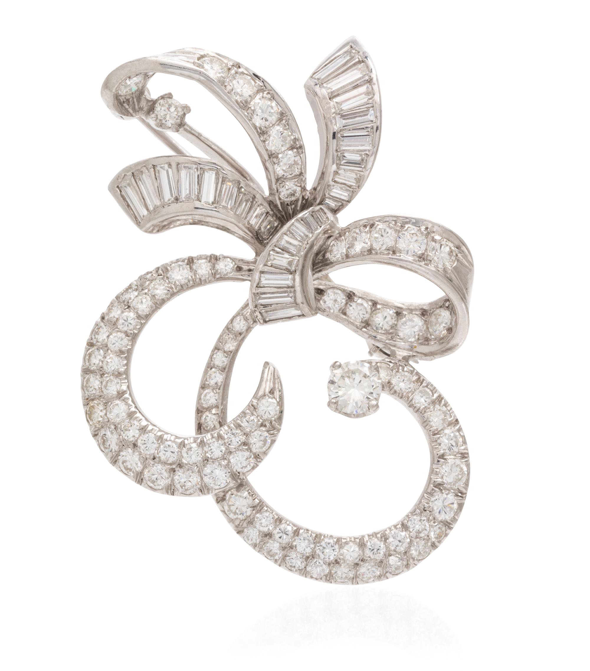 A Platinum and Diamond Bow Brooch, 7.70 dwts.